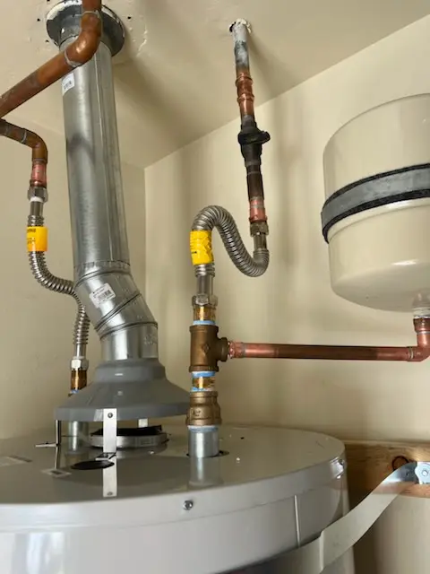 Water heater installation and plumbing repair in Mansfield Center